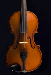 Beautiful antique violin over black