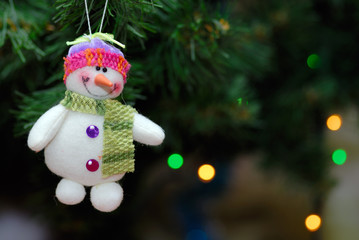 Snowball toy on christmas tree