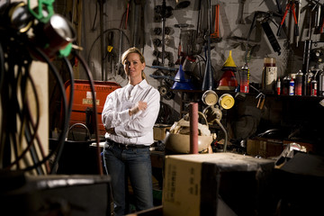 Female worker in office storage room
