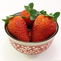 Fresh strawberries in small bowl