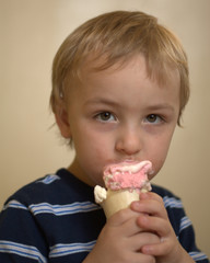 Blond Boy eating ice cream