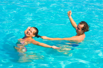 Couple playing in the water