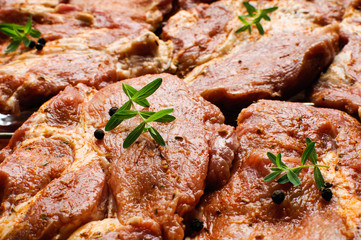 Fresh raw steaks ready to grill