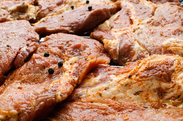 Fresh raw steaks ready to grill