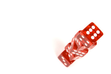 Red dices isolated on white.