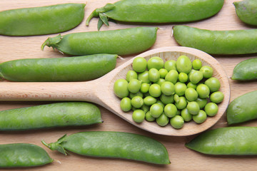 green beans on wooden background