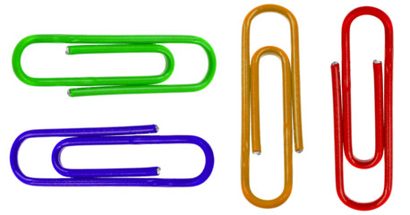 Colored paper clips isolated on white