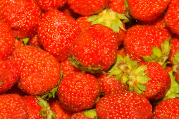 Fresh strawberries to background