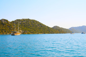 Splendid mountains and gulf with yachts.