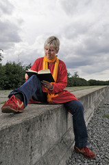 reading under clouds