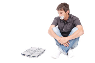Man with shouted mouth and chained laptop