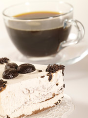 espresso coffee in glass cup with fancy cake