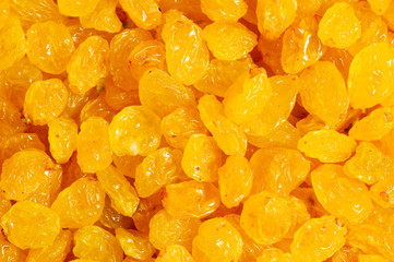 Background made of yellow dried raisins