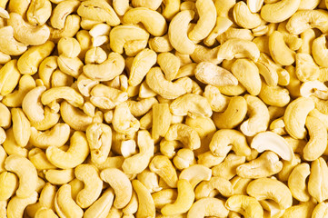 Cashew nuts arranged at the background © Elnur