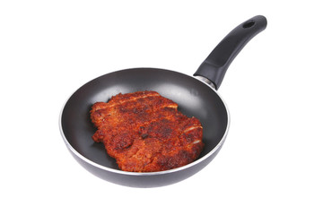 chicken meat on fry pan