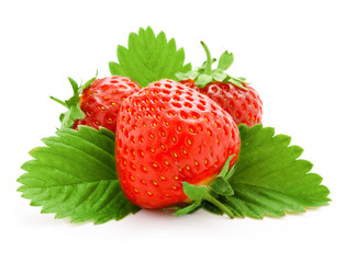 red strawberry fruits with green leaves