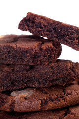 chocolate chip cookies broken on pieces and stacked ,isolated