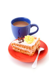 closeup of slice of tasty cake and coffee cup