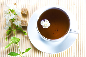Cup of tea with jasmin flower