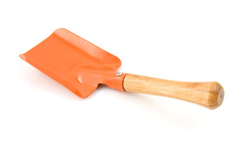 Garden tool, orange shovel on white background