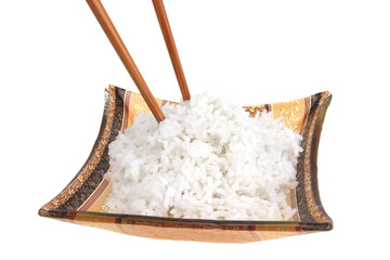 boiled white rice and sticks over white