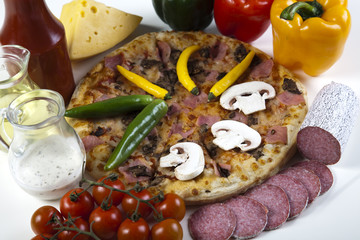 Vegetables with a pizza
