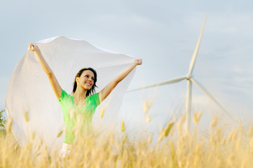 windpower and young woman  in outdoor, concept of alternative en