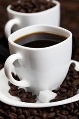 Coffee beans in a cup