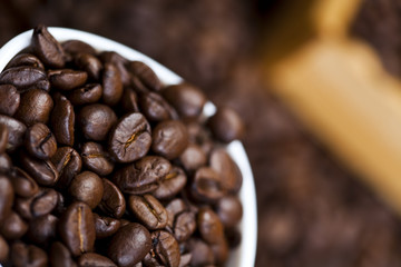 Coffee beans in a cup