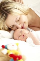 Obraz na płótnie Canvas junge mama mit baby