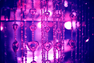 Glowing Christmas light background. Tint pink