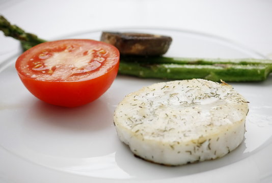Medall&oacute;n de merluza a la plancha con verduras