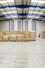 pallets with cartons in warehouse