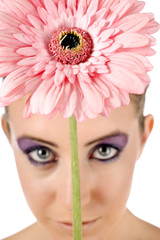 Closeup of flower above womans head