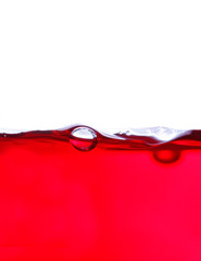 Red dye in water with white background