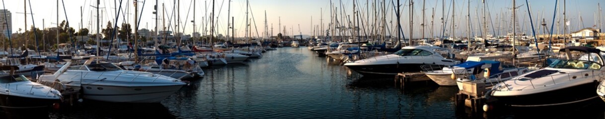 Fototapeta premium series of panoramic images from the harbor with yachts at dusk