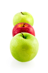 Three green and red fresh apples isolated on white background