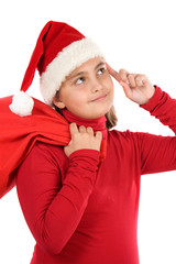 Beautiful girl with hat of Santa Claus thinking