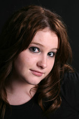 Fototapeta premium portrait of pretty teenage girl with long hair