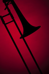 Trombone Silhouette Isolated on Red