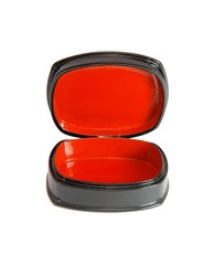 Open oval black casket with red lining isolated