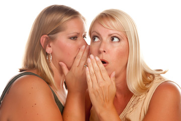 Two Blonde Women Whispering Secrets