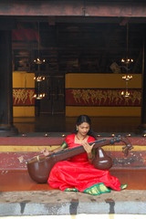 girl playing veena