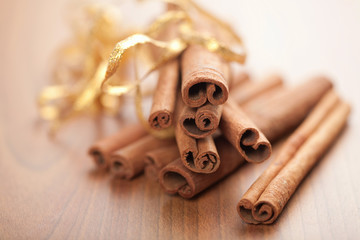 cinnamon with golden ribbon