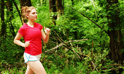 Obraz na płótnie Canvas Woman In Red Running