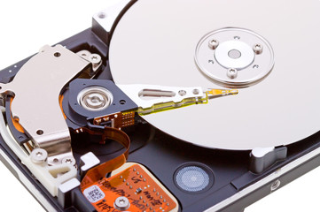 Close-up inside view of  hard disk isolated on white