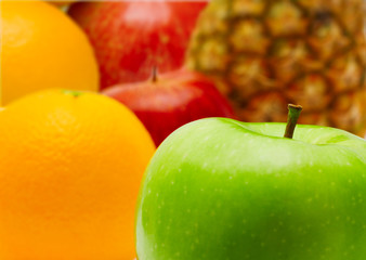 Fresh apple and citrus fruit closeup