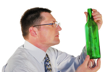 portrait of man in glasses with a bottle