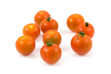 Fresh cherry tomatoes on white isolated on white background