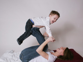 Mother and son playing together